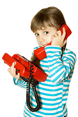 Image showing The girl with red phone