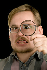 Image showing man with loupe