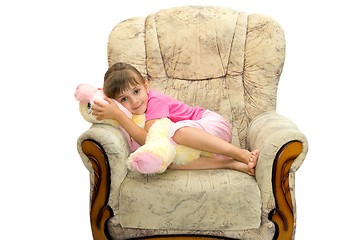 Image showing The girl in an armchair