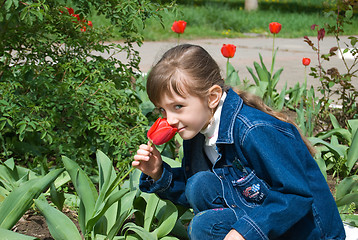 Image showing The girl with tulips