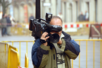 Image showing cameraman in action
