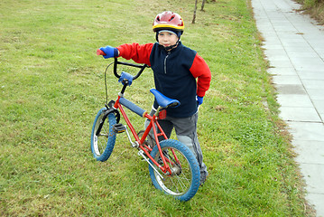 Image showing boy and bicycle