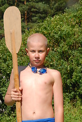 Image showing boy and paddle