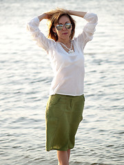 Image showing Lady on shore 