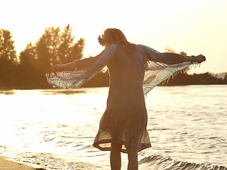 Image showing Lady on shore