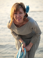 Image showing Lady on shore 