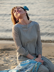 Image showing Lady on shore 