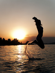 Image showing Jumping from water