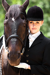 Image showing Horseback riding girl