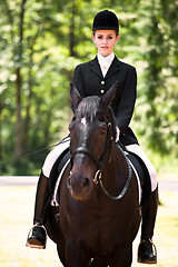 Image showing Horseback riding girl