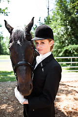 Image showing Horseback riding girl