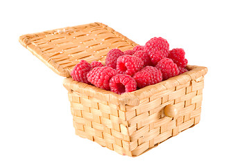 Image showing Bast-basket with a raspberry