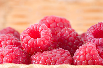 Image showing Bast-basket with a raspberry