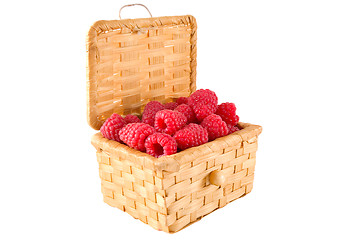 Image showing Bast-basket with a raspberry