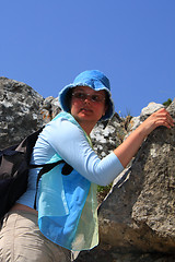 Image showing Climbing tourist woman