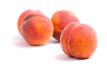 Image showing four peaches