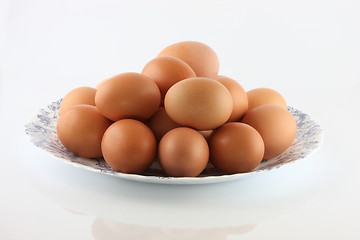 Image showing Eggs in a bowl on a white background