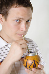 Image showing Man drinking mate