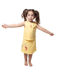 Image showing Little girl with arms outstretched