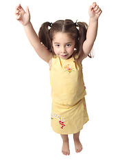 Image showing Preschool girl with arms raised above head