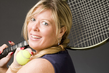 Image showing woman practicing tennis stroke