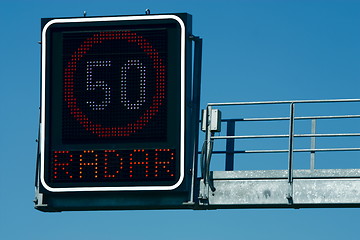 Image showing Traffic lights -  in front of blue sky