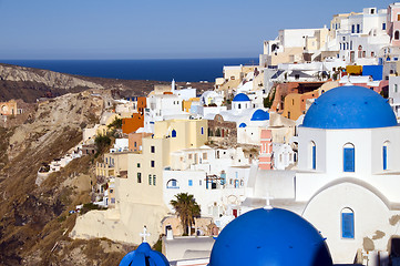 Image showing blue dome churches and cyclades architecture oia ia santorini gr