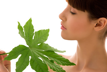 Image showing woman with green leaf