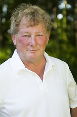 Image showing  happy  middle age senior tennis player male