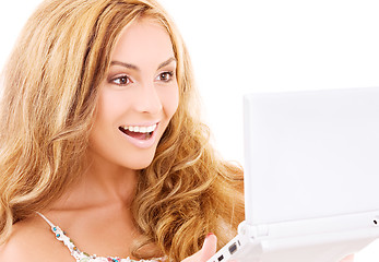 Image showing happy woman with laptop computer