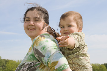 Image showing Woman with her child