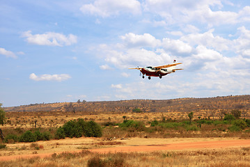 Image showing Small aircraft takeoff in Africa