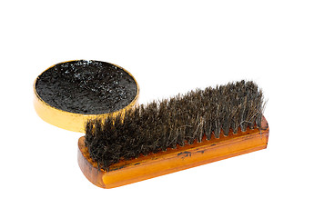 Image showing Shoe wax and a brush 