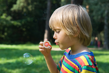 Image showing Boy with soap bubbles