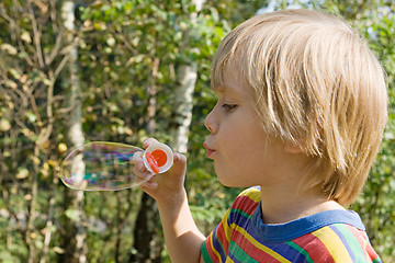 Image showing Boy with soap bubbles