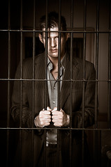 Image showing Businessman in jail