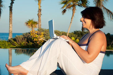 Image showing lovely woman with laptop computer