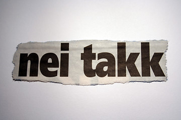 Image showing Word thorn out of a newspaper