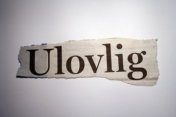 Image showing Word thorn out of a newspaper