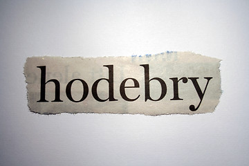 Image showing Word thorn out of a newspaper
