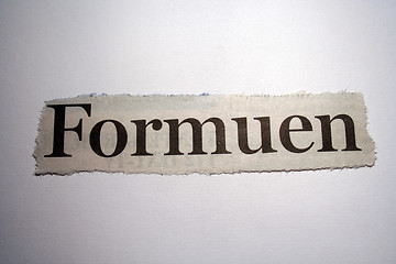 Image showing Word thorn out of a newspaper