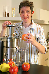Image showing Smiling Man with squeezer