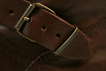 Image showing Metal buckle on leather