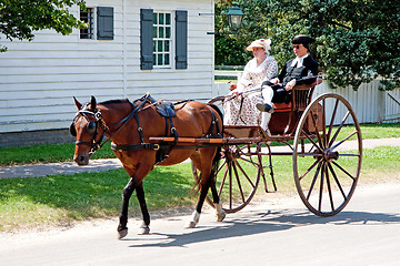 Image showing Colonial horse carriage with couple