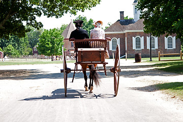 Image showing Colonial horse carriage with couple