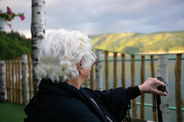 Image showing Senior woman with walking stick