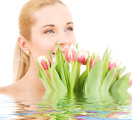 Image showing happy woman with flowers