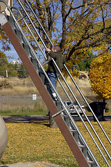 Image showing Kid Climbing Up the Slider