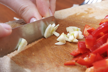 Image showing Chopping the Garlic