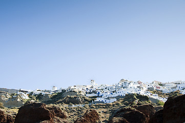 Image showing oia santorini town built into volcanic cliffs panorama view